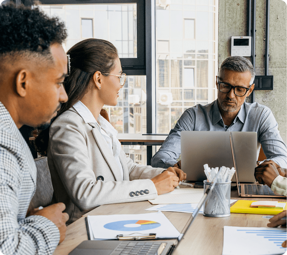 Business meeting with diverse team at table