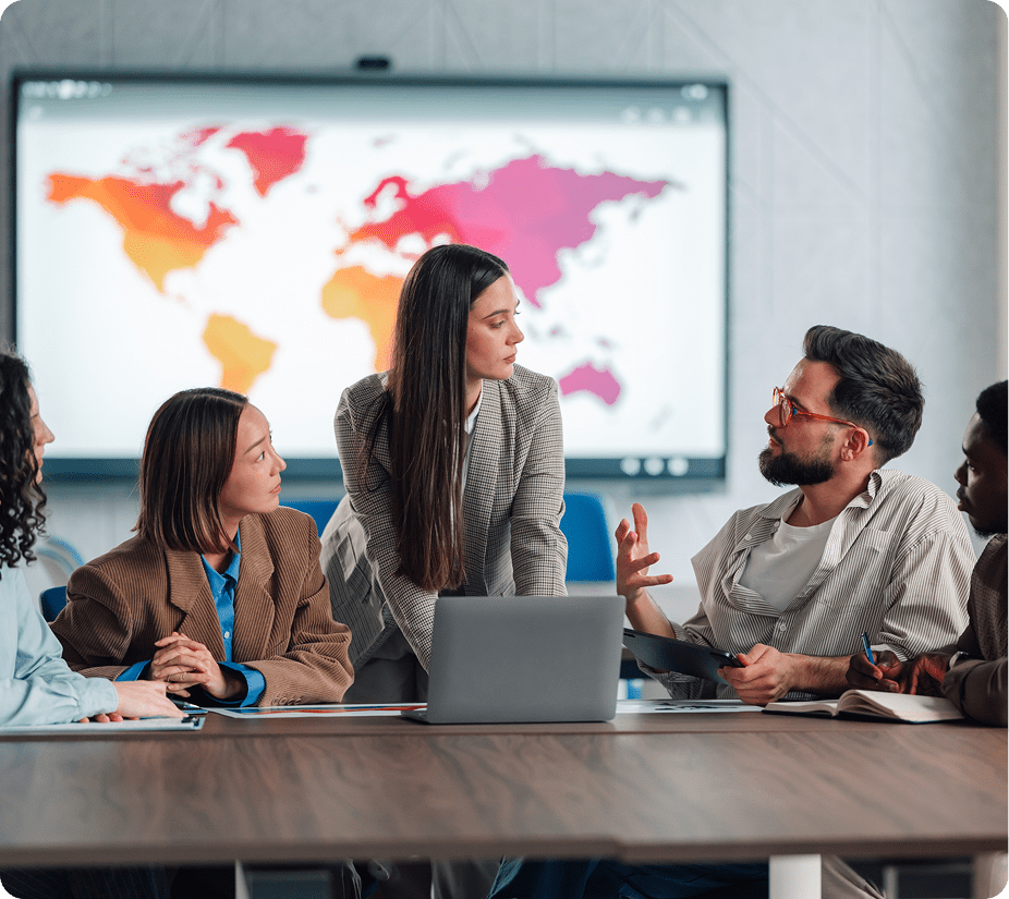 Team discussing with world map background