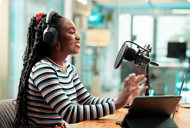 Podcast host wearing headphones and speaking