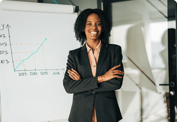 Businesswoman standing by growth chart