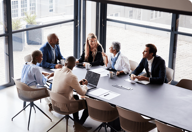 Colleagues collaborating at conference table